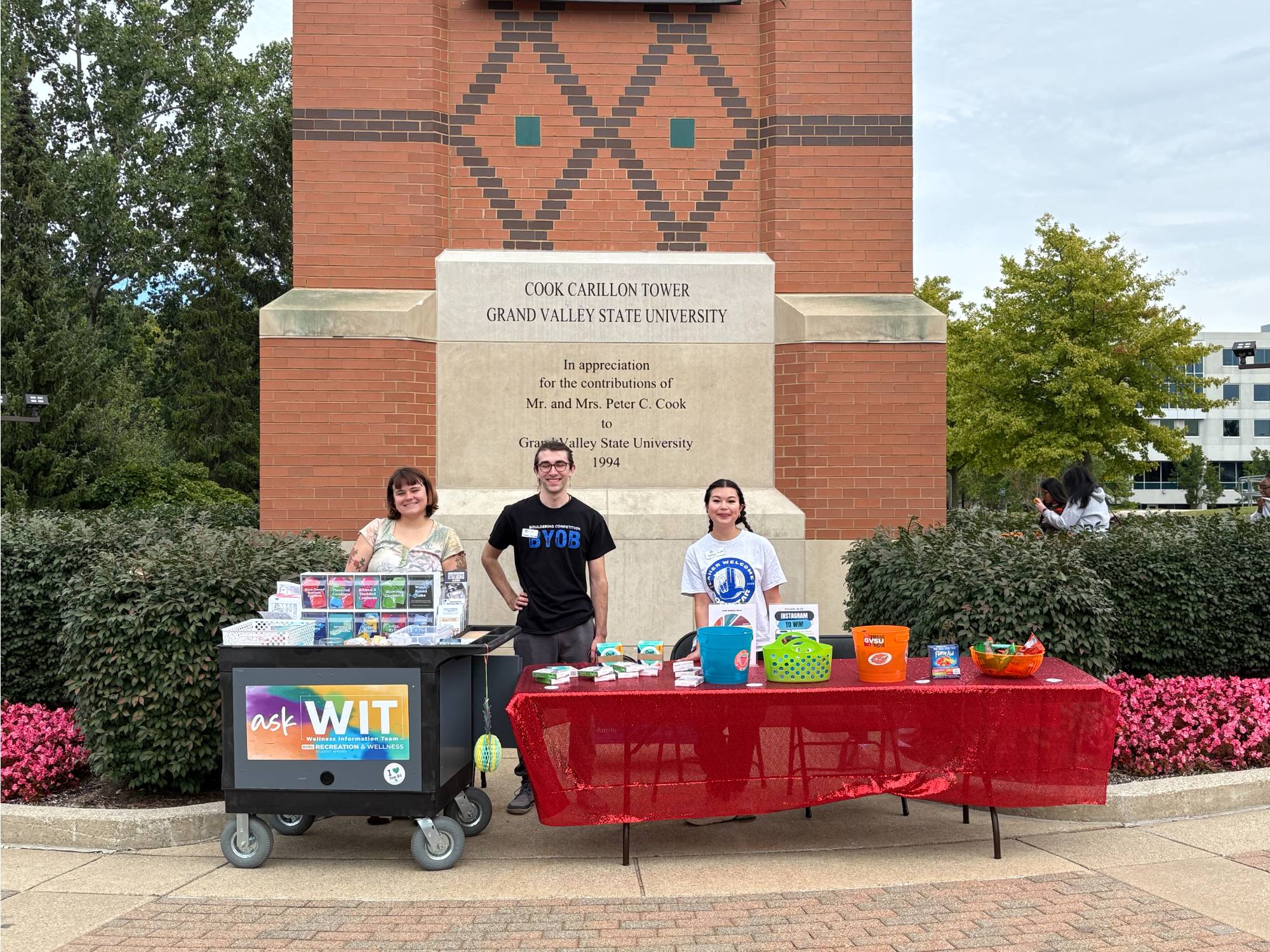 Two WIT peer educators tabling at Kirkhof posing for the picture